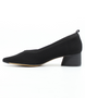 Black women’s ribbed flyknit low‑heel pump with pointed toe and cushioned footbed.