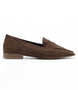 Chocolate women’s micro‑suede pointed‑toe loafer with penny strap and cushioned footbed.