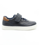 Navy boys’ synthetic leather casual sneaker with lace‑up front, hook‑and‑loop strap and contrast heel patch.