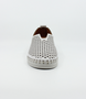 White women’s nubuck perforated slip‑on with scalloped pattern, contrast stitching and cushioned sole.