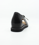 Black women’s leather closed‑heel sandal with side cut‑outs, lace‑up front and low wedge sole.