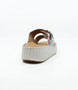 Multi women’s leather slide sandal with twin buckle straps and stitched platform sole.