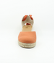 Brick women’s canvas espadrille wedge with closed toe, ankle ties and jute platform sole.