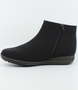 Black women's stretch fabric ankle boot with side zipper and cushioned footbed.