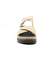Beige women's leather sandal with crossover straps, buckle fastening and cushioned footbed.