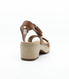 Muskat women's leather sandal with adjustable buckle, cushioned footbed and block heel.