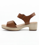 Muskat women's leather sandal with adjustable buckle, cushioned footbed and block heel.