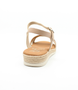 Nude girls' leather sandal with crossover straps, woven detailing, buckle fastening and cushioned footbed.