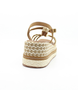 Brown women's raffia platform sandal with braided straps, woven midsole and adjustable ankle strap.