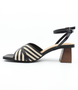 Off White women's leather sandal with alternating straps, adjustable ankle strap and cushioned footbed.
