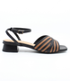 Tan women's leather sandal with perforated two‑tone straps, adjustable ankle strap and cushioned footbed.