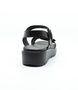 Black women's leather sandal with Velcro fastening, padded insoles and platform sole.
