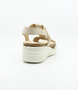 Beach women's suede comfort sandal with Velcro fastening, removable footbed and wedge sole.