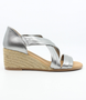 Pewter women's leather wedge sandal with criss-cross straps and jute-wrapped heel.