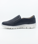 Navy women's leather casual slip-on with side zip, perforated vamp and flexible sole.