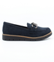 Navy women's suede loafer with metal buckle trim and treaded sole.