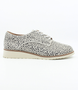 Ocelot women's lace-up leather shoe with low wedge and stitched detailing.