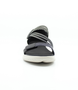 Black women's elastic strap sandal with adjustable fastening, padded insole and flexible outsole.