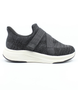 Black women's flyknit slip-on sneaker with cross strap and cushioned sole.