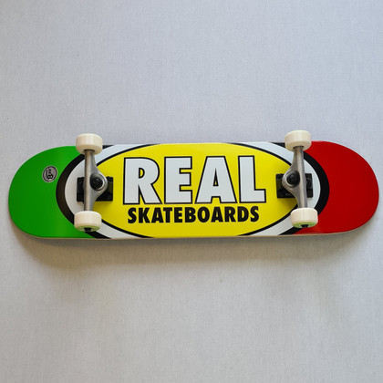 REAL Skateboards  8.25" Team Edition Oval Complete Board - Yellow/Red/Green