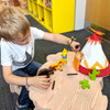 Child playing with our naative indian playset