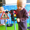 Child playing with our traffic set
