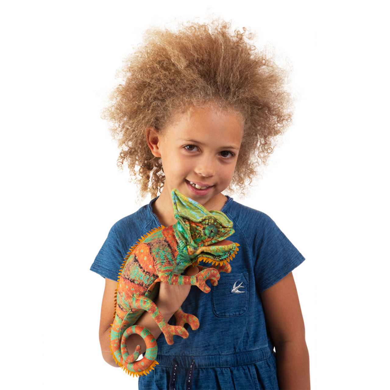 Girl playing with Chameleon Puppet Folkmanis