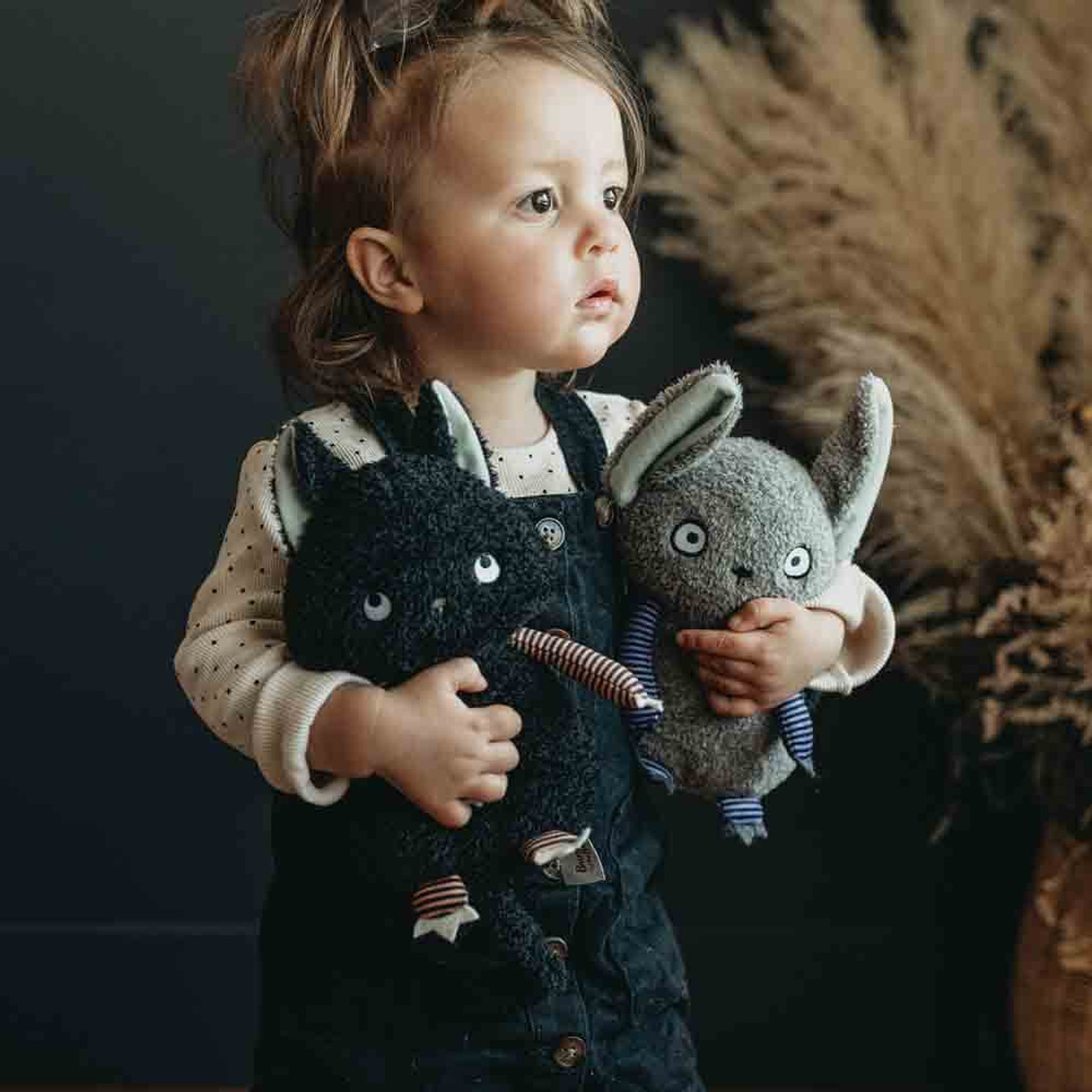 Child with Kittty Boo Boo and Eek Bat Halloween Toys