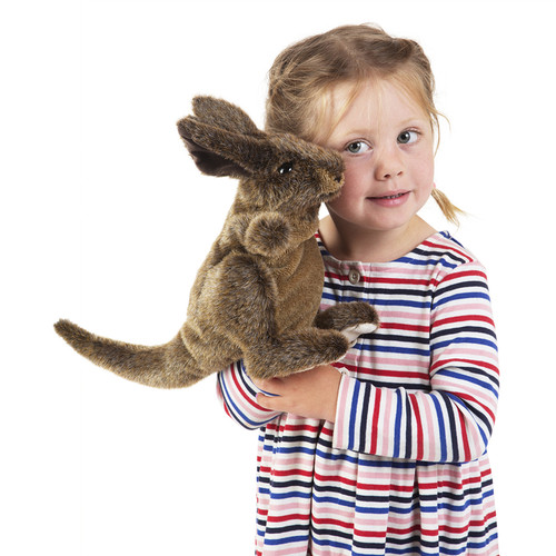 Girl playing with Kangaroo Puppet Folkmanis
