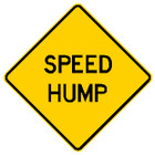 diamond shape, yellow sign, black words "Speed Hump"