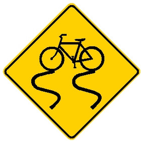 diamond shape, black and yellow. image of bike slipping