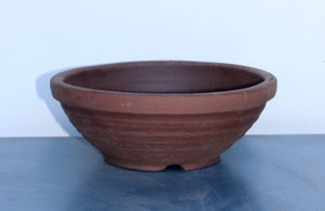 Japanese Yokkaichi Medium Brown Clay Unglazed Circle with Textured Tapered Sides (Has Ridges and Bumps) 7.75"Dia x 3.25"H Irregular Ceramic Bonsai Pot - Main Image Japanese Yokkaichi Medium Brown Clay Unglazed Circle with Textured Tapered Sides (Has Ridges and Bumps) 7.75"Dia x 3.25"H Irregular Ceramic Bonsai Pot - Main Image