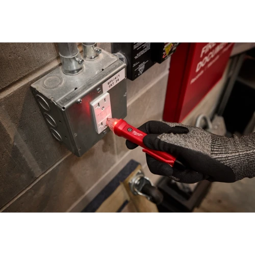 Milwaukee 3200-20 Voltage Detector testing an outlet