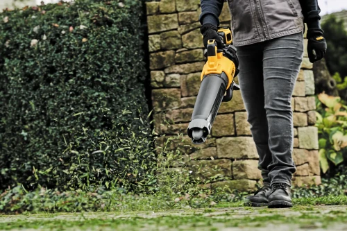 DEWALT DCBL722P1 Handheld Blower in use