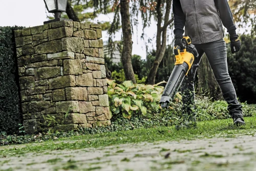 DEWALT DCBL722P1 Handheld Blower in use
