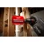 Milwaukee BIG HAWG cutting nail-embedded wood