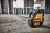 DEWALT DW088CG Green Cross Line Laser in use