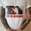 Life is boring white tee with a print of a bored girl