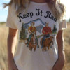 keep it rad white tee with a picture of two people riding horses