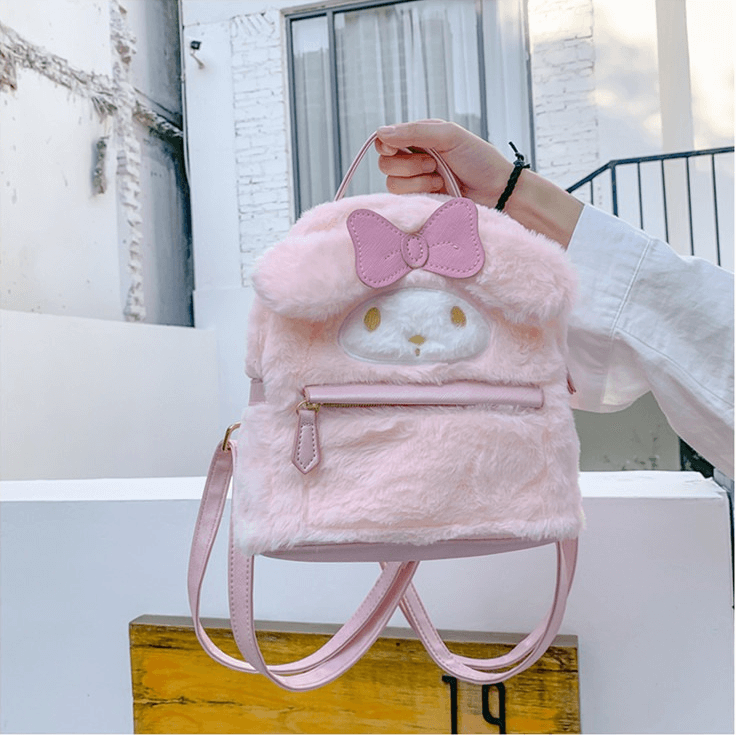 hello kitty my melody backpack 14 Inch Plush She is a white rabbit inspired by Little Red Riding Hood which is why she wears a red (or pink) hood that covers her ears often having a bow or a flower on her right side My Melody Sleepover All-over Print