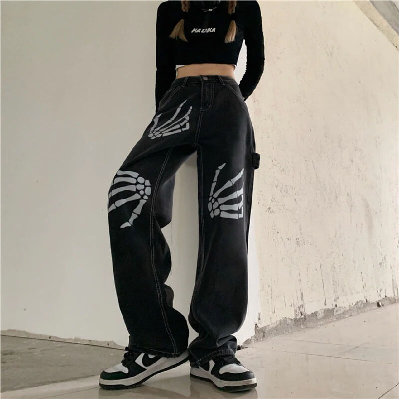 https://cdn11.bigcommerce.com/s-c7qlm8a06j/images/stencil/1280x1280/products/2666/26488/y2k-skeleton-hands-denim-pants_5__46778.1657793386.jpg?c=1?imbypass=on