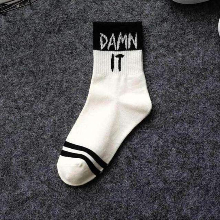 shut up slogan socks in black and white