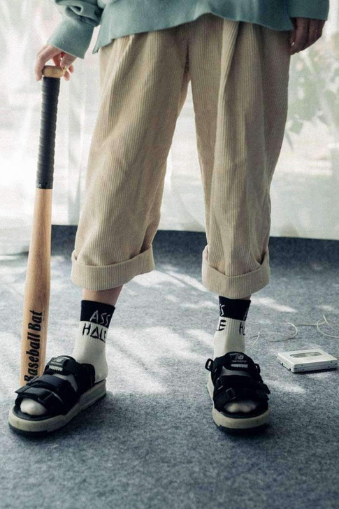 shut up slogan socks in black and white