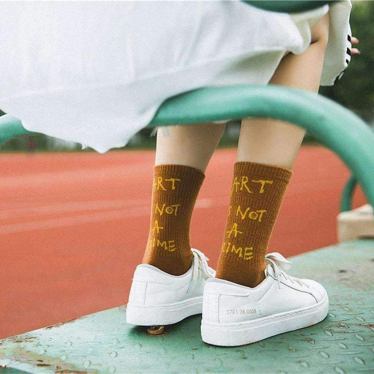 art is not a crime dark yellow socks art is not a crime dark yellow socks