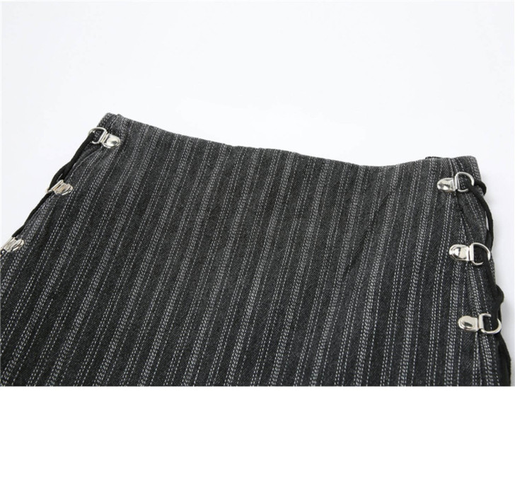 girl wearing y2k aesthetic style pleated, gray, bandage mini skirt girl wearing y2k aesthetic style pleated, gray, bandage mini skirt