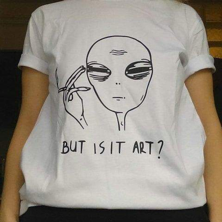 but is it art white tee with a drawing of an alien smoking but is it art white tee with a drawing of an alien smoking