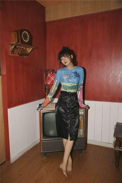 Sheer mesh top graphic tee with comic characters on