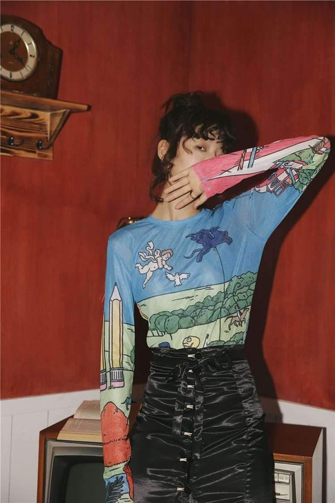 Sheer mesh top graphic tee with comic characters on