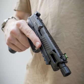 A Sig Sauer P365 FUSE with True Precision slide, threaded barrel, and trigger in black nitride.