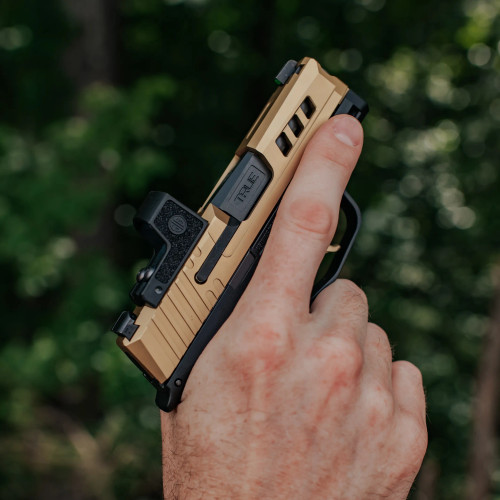 True Precision Sig Sauer P365 with gold slide, black non-Threaded barrel and gold trigger.